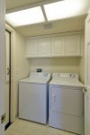 Downstairs full size washer & dryer provided, door exits to patio garden area.